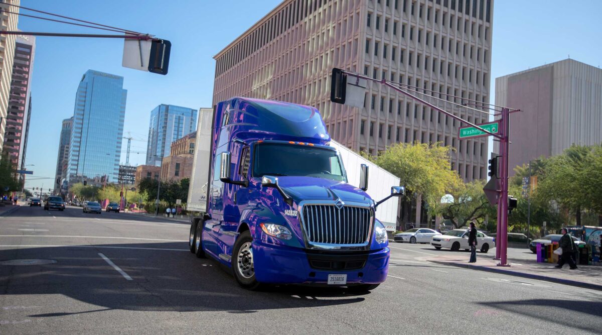 Purple truck in a city
